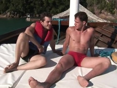 Young Gay Couple Making Love In The Boat