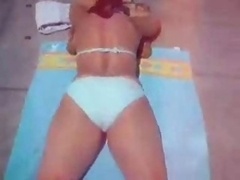 Donna Laying out in Bikini