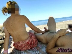 MissCreamy performs bold public handjob on a big cock at nudist beach, ending with a creamy cumshot