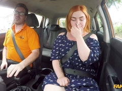 Voluptuous redhead fucks in car