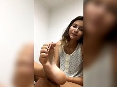 steamy woman show her feet soles and toes munch