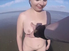 Girl nude at beach with oiled boobs and ass experiencing pussy contractions