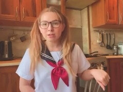 Girl in Japanese school uniform masturbates and reaches orgasm in the kitchen while cosplaying