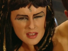 Horny Cleopatra gets pussy licked when watching hard sex